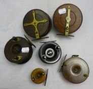 A selection of turned wood fishing reels