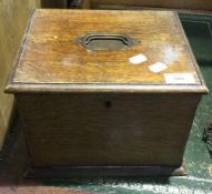 A Victorian oak stationary box