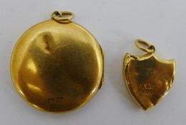 Two 15 ct gold pendant lockets (7 grammes all in)