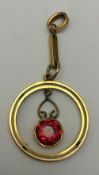 A 9 ct rose gold pendant