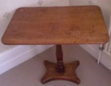 A Victorian mahogany pedestal tilt top side table