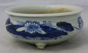 A 19th century Korean blue and white decorated porcelain censer on three squat feet