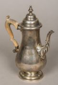 A George II silver coffee pot - WITHDRAWN CONDITION REPORTS: Handle worn and loose