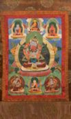 A Tibetan hand painted Thanka Typically worked, framed. 76 x 116 cm overall.