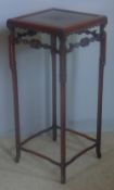 A 19th century Chinese urn stand,