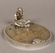 An early 20th century silvered bronze ashtray Modelled with a Native American Indian and opposing