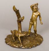 A 19th/20th century Continental gilt bronze allegorical group Worked as a young woodcutter warding