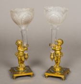 A pair of 19th century French enamel decorated gilt bronze and cut glass single stem epergnes Each