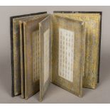 A Chinese book The carved cover enclosing the fabric framed inscribed mutton fat jade pages.