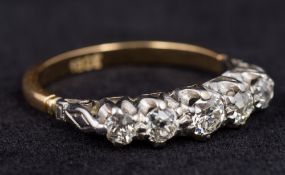 An 18 ct gold and diamond five stone ring CONDITION REPORTS: Generally in good