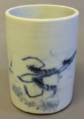 A Chinese blue and white porcelain brush pot Of circular section, decorated with prawns,