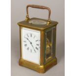 A 19th century French brass cased repeating carriage clock Of typical form,