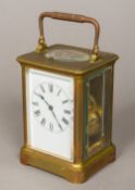 A 19th century French brass cased repeating carriage clock Of typical form,