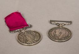 A George V Meritorious Service Medal and a Long Service and Good Conduct Medal,