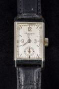 An 18 ct white gold cased Patek Philippe wristwatch The rectangular silvered dial with Arabic