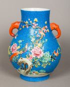 A Chinese porcelain vase Of flared bulbous form,