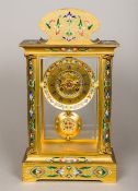 A 19th century enamel decorated gilt cased four glass regulator mantel clock The domed case