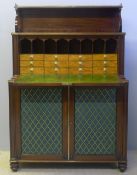 A Regency brass mounted and inlaid mahogany secretaire cabinet,