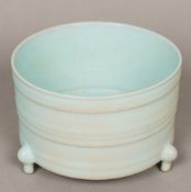 A Chinese crackle glaze censor Of ribbed low circular form, standing on three squat feet,
