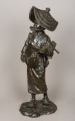 A large Japanese Meiji period patinated bronze statue Modelled as a female figure in tradition