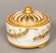 A 19th century Japanese Satsuma koro Of circular form, with removable pierced domed lid,