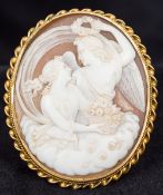 A 19th century unmarked yellow metal framed cameo brooch Centred with a classical maiden and an