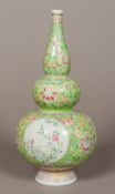 A 19th century Chinese double gourd vase Decorated with bird,