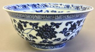 A Chinese blue and white porcelain bowl Extensively decorated with lotus strapwork,