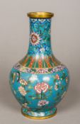 A 19th century Chinese gilt copper and cloisonne vase Decorated with lappets,