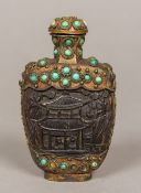 A Chinese cabochon turquoise mounted snuff bottle The main carved body probably coconut. 9.