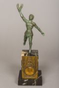 An early 20th century bronze art metal trophy Modelled as an Olympian athlete,