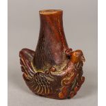 A 19th century Chinese carved horn snuff bottle The base carved with a bird. 6.5 cm high.