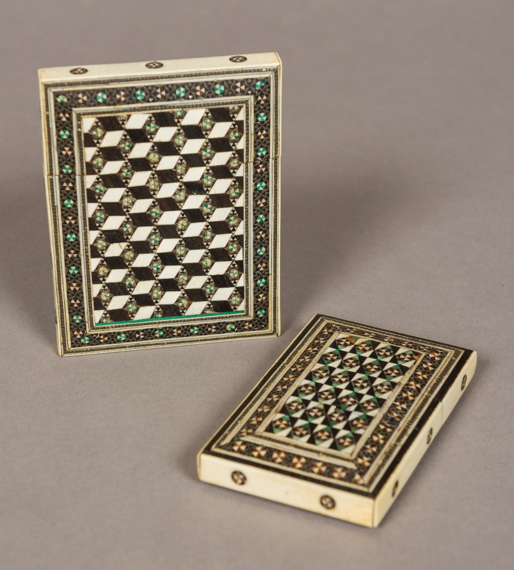 A 19th century Vizagapatam ivory and ebony card case Of typical flattened rectangular form;