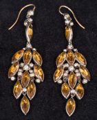 A pair of paste and stone set, possibly topaz, ear pendants Each set on an unmarked silver ground,