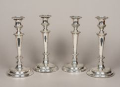 A set of four George III silver candlesticks, hallmarked Sheffield 1815,