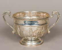 An Edwardian silver twin handled presentation rose bowl, hallmarked London 1909,