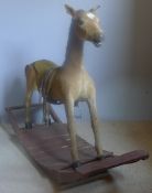 A Victorian stuffed and mounted taxidermy rocking pony Naturalistically posed,