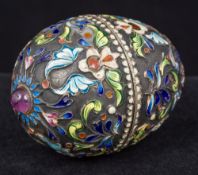 A Russian enamel decorated silver egg form box and cover,