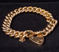 An Edwardian 15 ct rose gold bracelet With heart shaped locket.