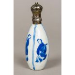 A Chinese silver mounted blue and white porcelain scent bottle Of segmented oval form,