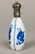 A Chinese silver mounted blue and white porcelain scent bottle Of segmented oval form,