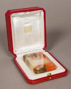 An Art Deco diamond set white metal mounted agate card case Of rounded rectangular section,