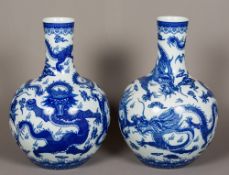 A pair of Chinese blue and white porcelain vases Each decorated with five clawed dragons above