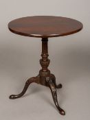 A 19th century mahogany miniature apprentice piece model of a George III tilt-top tripod table The