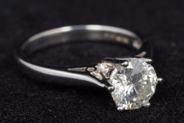 An 18 ct white gold 1 carat diamond set solitaire ring Size J,