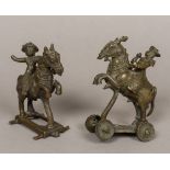 A pair of Indian cast bronze figures of horsemen Naturalistically modelled on wheeled plinth bases.