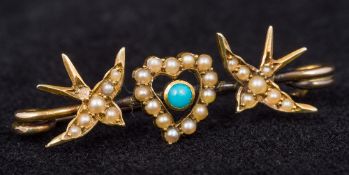 A 15 ct gold seed pearl and turquoise set bar brooch Worked with a heart flanked with swallows.