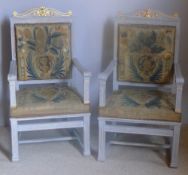 A pair of 19th century painted carved open armchairs Each with gilt heightened top rail above the