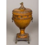 A Victorian turned oak twin handled urn and cover With carved decoration,