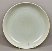 A Chinese porcelain dish The interior with incised decoration,